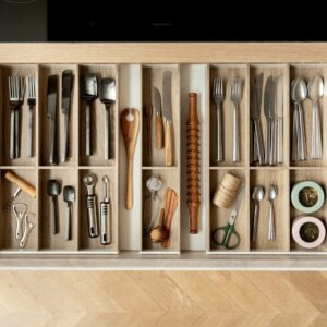 a drawer filled with different types of utensils